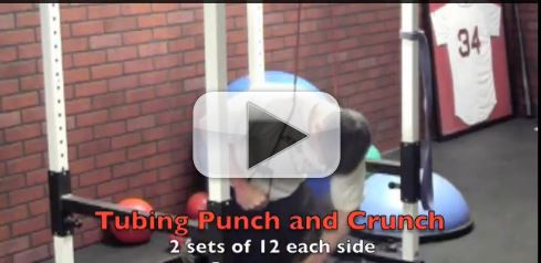 tubing punch and crunch exercise