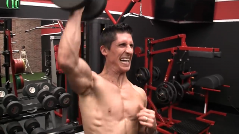 cheat lateral into dumbbell push press shoulder exercise