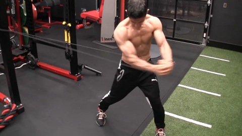 foot pivots on sledgehammer swing abs exercise