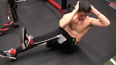 recliner elbow to knee tuck abs exercise