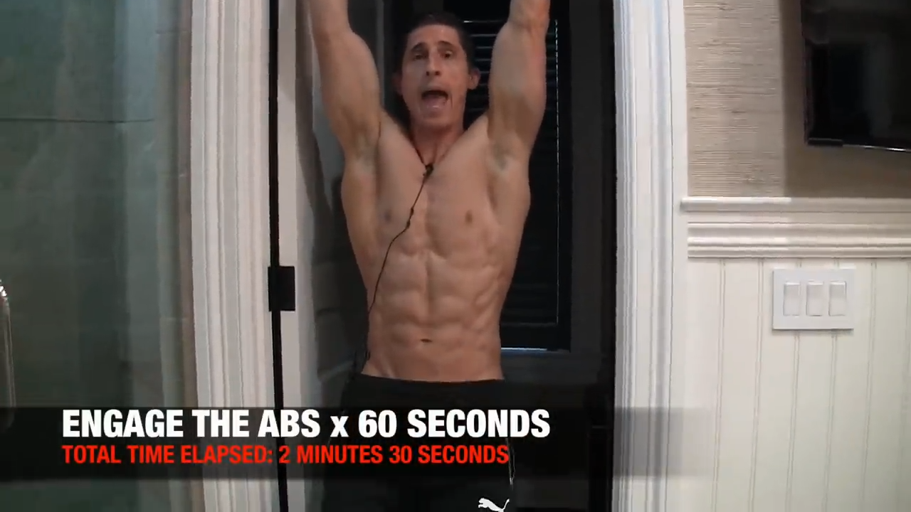 perform this hanging abs exercise for 60 seconds every morning to engage the abs