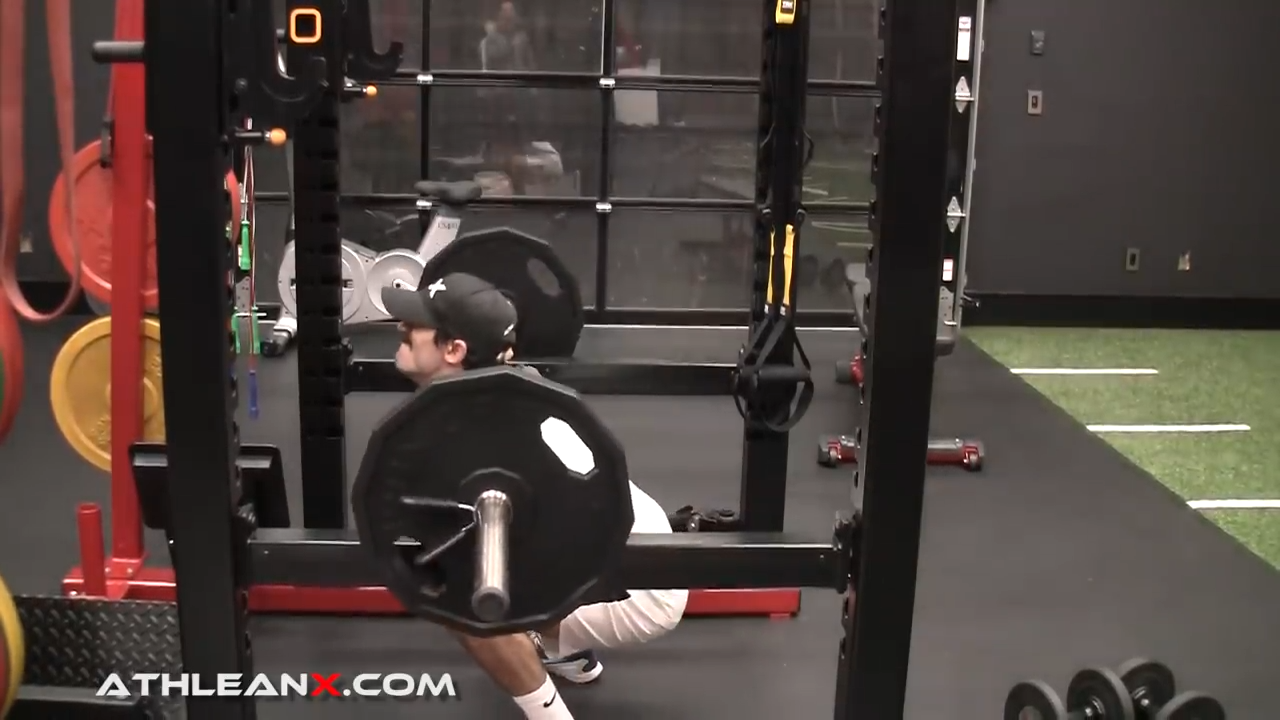 pause squats with proper form using full range of motion on squat