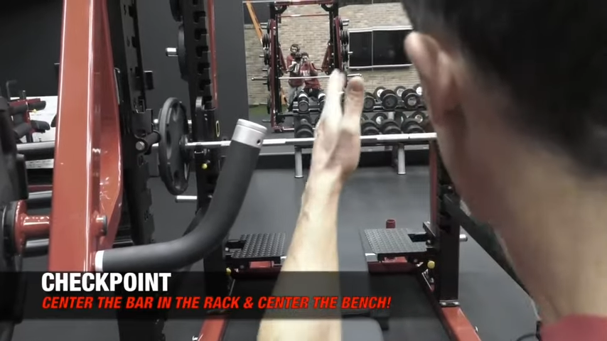 center the bar in the rack bench press