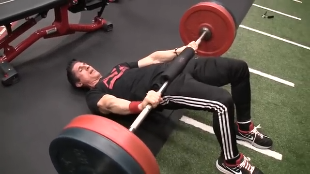 barbell hip thrusts on the floor